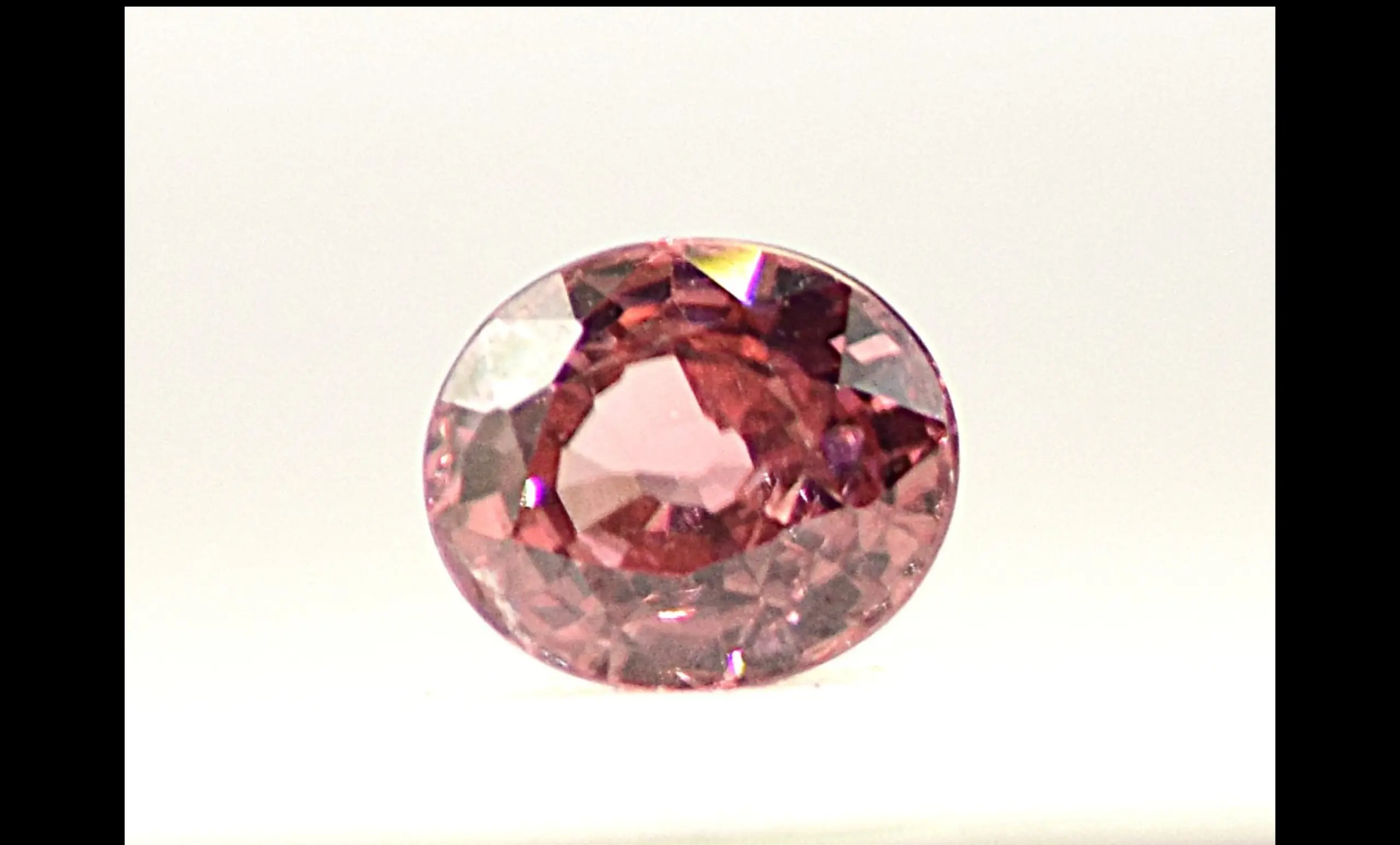 Zircon, Brilliant Pink Oval Cut Sparkling Gemstone – 1.63 Carats