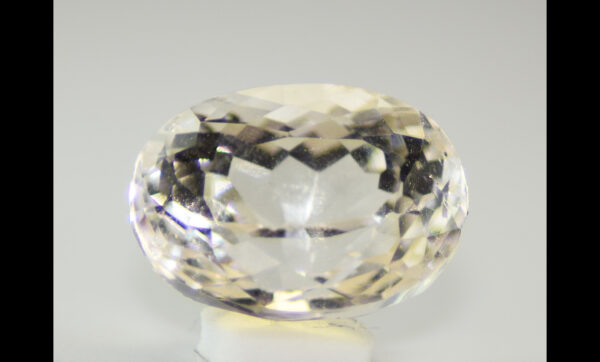 Topaz, Very Light Yellow Oval Cut UV-Active Gemstone – 9.03 Carats