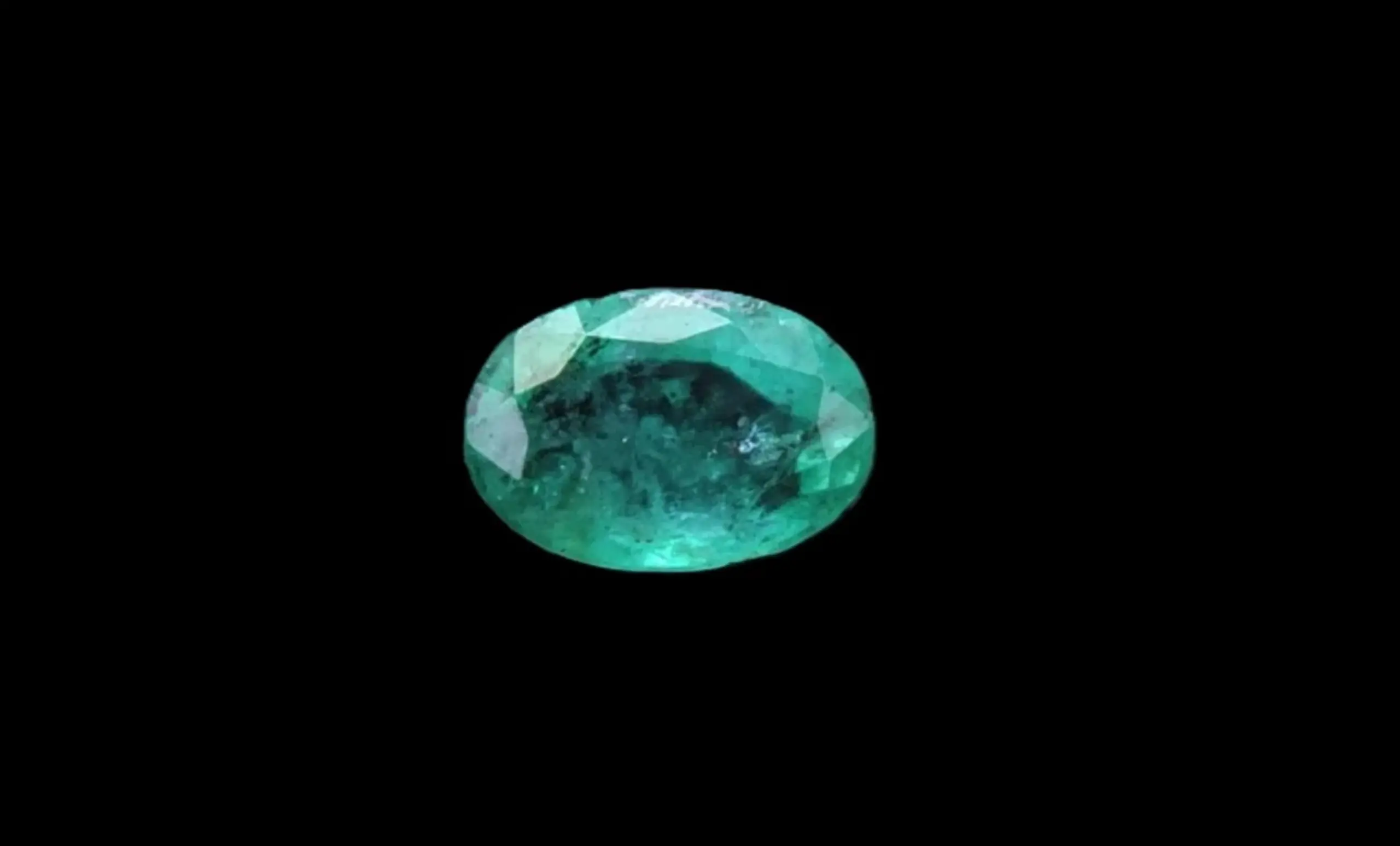 Emerald, Glowing Green Oval Cut Gemstone – 0.48 Carats