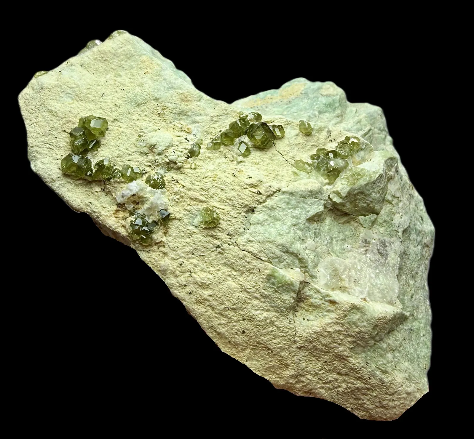 Mineralogical Genesis of Demantoid in Serpentinized Host Rock